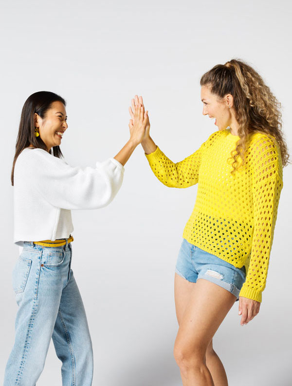 Women high five hero banner mobile